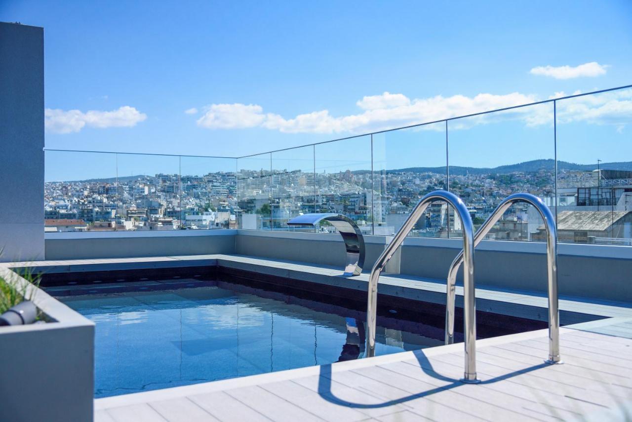 Onoma Hotel سالونيك المظهر الخارجي الصورة A pool with a glass balustrade